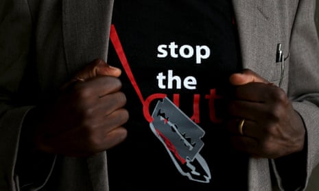 Person wearing a T-shirt that reads: "Stop the cut".