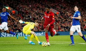 Liverpool’s Divock Origi scores their first goal.