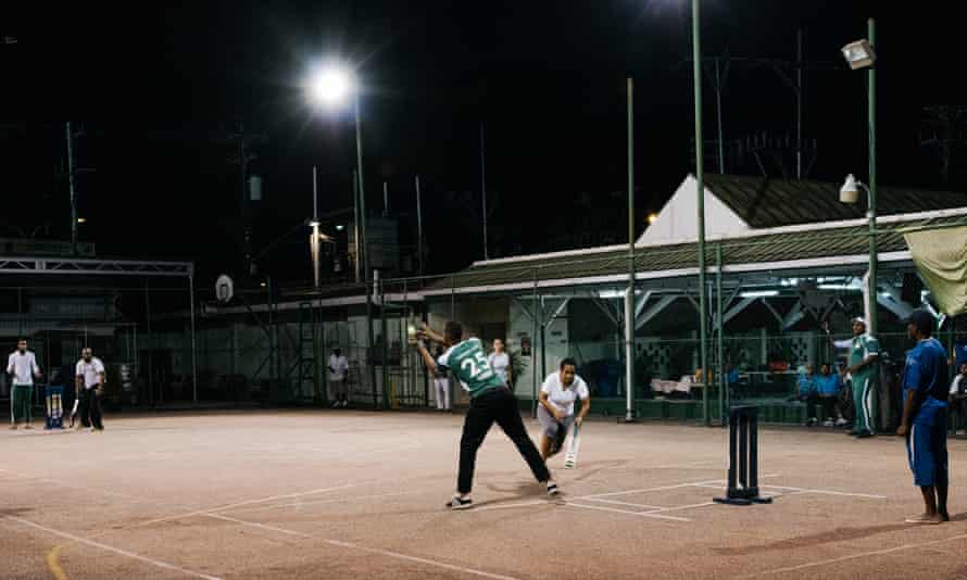 ‘It’s a Trini thing’: cage cricket played on a tennis court at the Harvard Club.