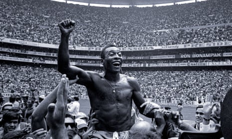 Pelé celebrates winning the 1970 World Cup, his third, in Mexico City’s Azteca stadium.