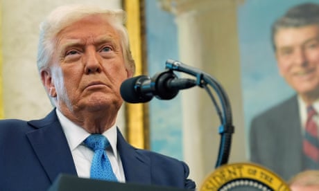 US president Donald Trump speaks with reporters at the White House