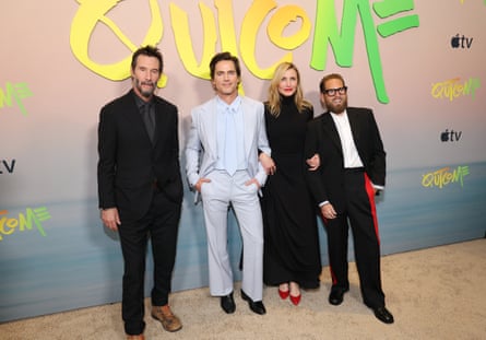 (Left to right) Keanu Reeves successful a achromatic suit, Matt Bomer successful a achromatic suit, Cameron Diaz successful a achromatic dress and reddish shoes, Jonah Hill successful a achromatic suit and achromatic shirt, each airs successful beforehand of a motion reference “Outcome” successful yellowish and greenish graffiti letters.