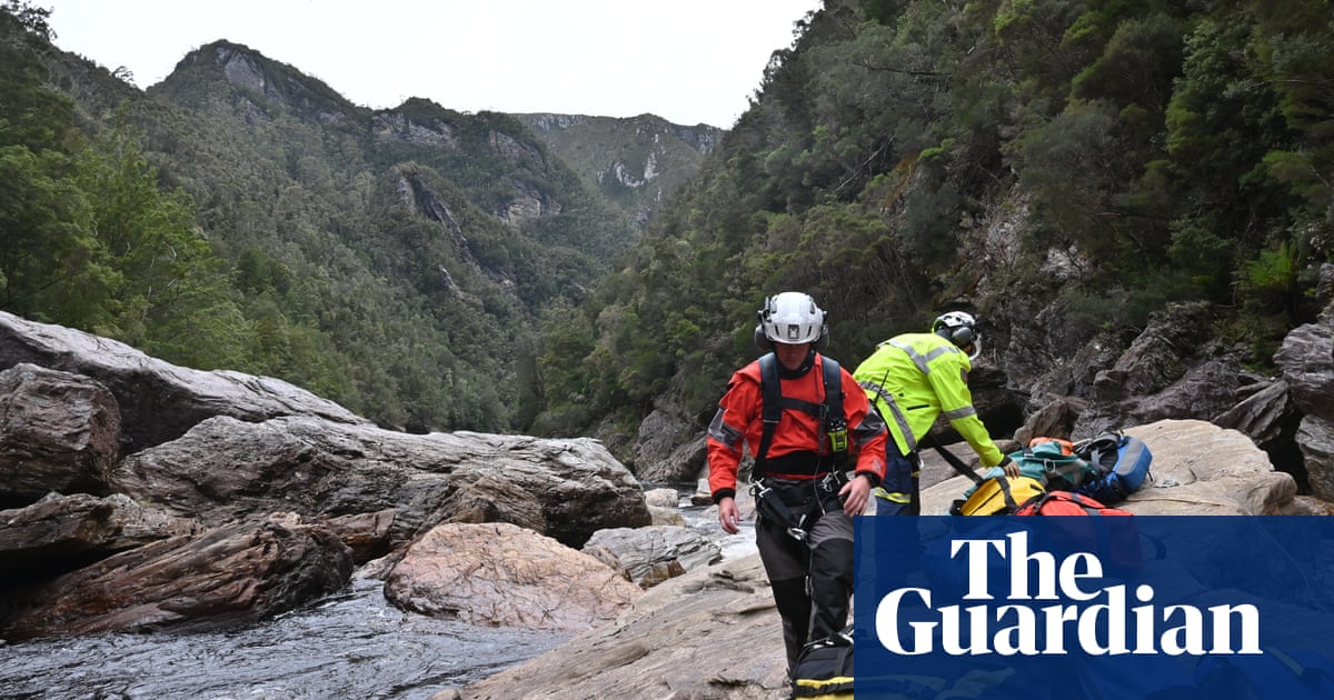 'He was wedged like an hourglass': rescuers describe 20-hour ordeal ending with amputation of rafter's leg