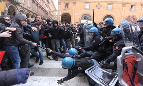 Protesters against Forza Nuova clash with police in Bologna, Italy, 16 February.