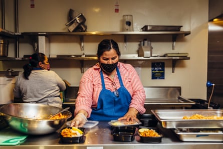 woman in apron cooks