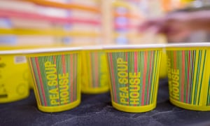 Cups of soup lined up at Pea Soup House, an installation linking soup to air quality.