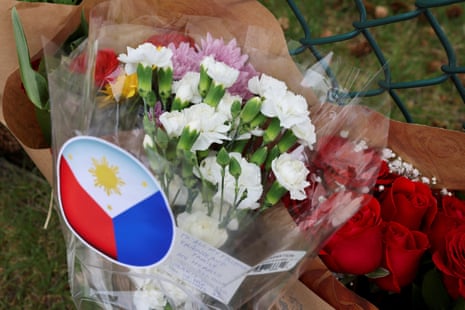 a bouquet of flowers marked with a Filipino flag sticker