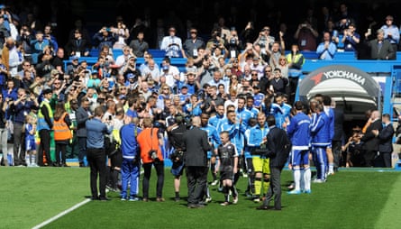 Leicester players receive a guard of honour from Chelsea at Stamford Bridge