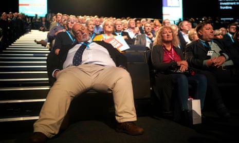 Party members at the Tory conference. One man seems to have taken posture advice from Jacob Rees-Mogg.