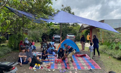Residents who still fear aftershocks are setting up makeshift tents for their families.