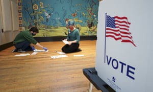 People organize absentee ballots in Madison, Wisconsin, on 7 April.