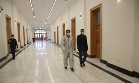Doctors, wearing face masks, at 150-room Darul Aman Palace in Kabul, which has been turned into a hospital to treat coronavirus victims.