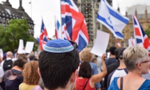 Protesters campaigning against antisemitism in the Labour outside Parliament