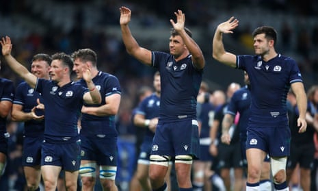 Scotland players react after the Rugby World Cup Pool B match between Scotland and Romania