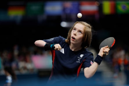 Bly Twomey with her eyes on the ball as she prepares to hit a shot against Kubra Korkut in their semi-final match