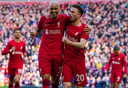 Liverpool's Diogo Jota (right) celebrates scoring the opening goal with Fabinho during the Premier League match against Nottingham Forest at Anfield.