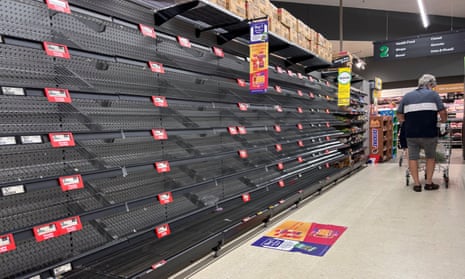 Empty shelves at a Woolworths on Bribie Island, Brisbane, yesterday.