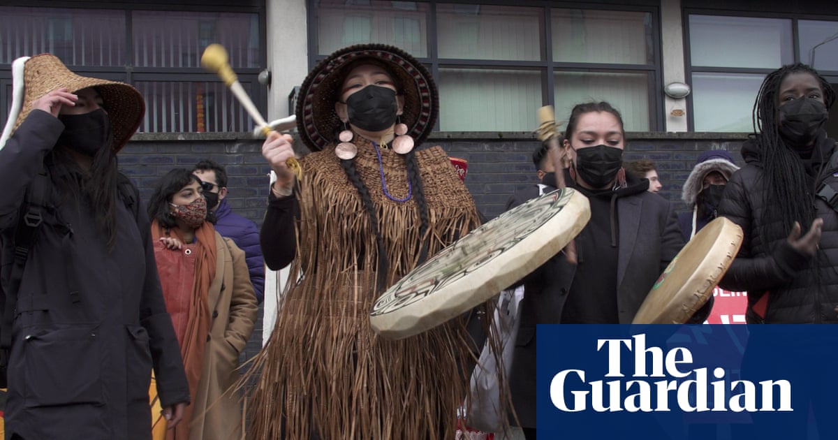 Cop26 activists demand Biden declare climate emergency at protest held by Indigenous leaders – video