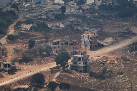 An Israeli flag hangs from a building in Lebanon.