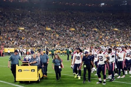 New England Patriots cornerback Isaiah Bolden is brought off the field after being injured during the second half of Saturday’s preseason game against Green Bay.