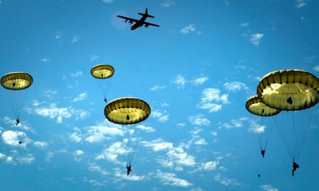 Paratroopers over Normandy jump during the 70th anniversary of D-day operations, in Sainte-Mere-Eglise.