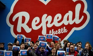 Protestors before Repeal the 8th mural outside Dublin’s Project Arts centre, which was painted over at the behest of the Irish charities regulator.