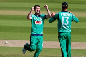 Ireland’s Curtis Campher celebrates with Harry Tector after taking the wicket of England’s Moeen Ali.