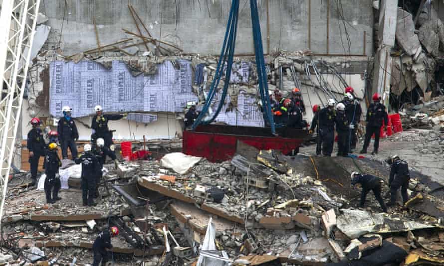 The south Florida urban aearch and rescue team look through rubble for survivors.