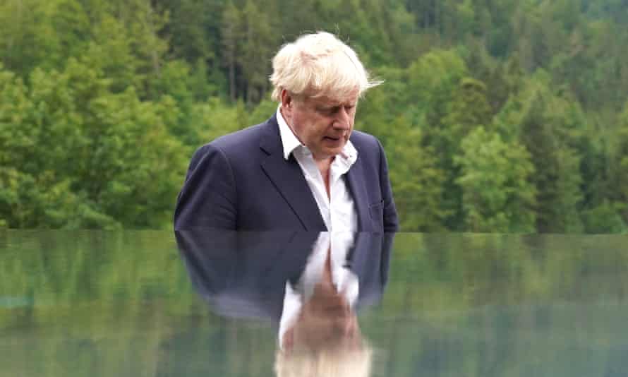Chris Pincher: Shameful former Tory whip adds to sense of crisis around Johnson | Conservatives 1 Boris Johnson outside, in suit but no tie, head bowed.