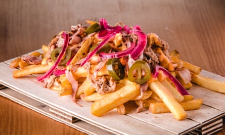 Loaded french fries with pulled pork, jalapenos, cheddar sauce and onion.
