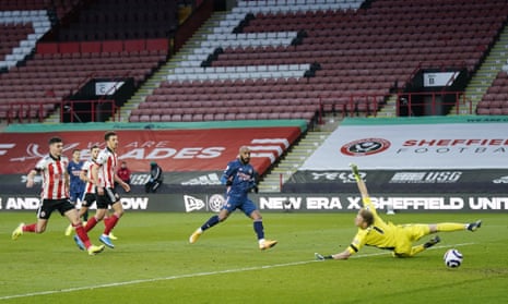 Arsenal’s Alexandre Lacazette, centre, scores his side’s opening goal.