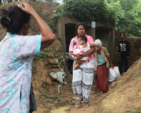 Thai people who fled the clashes take shelter in Surin province, north-eastern Thailand, on Thursday.
