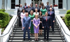 Queensland premier, Steven Miles (left front), is seen with his new ministers outside Government House in Brisbane.