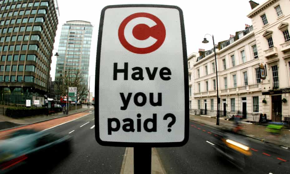 A road sign marks the start of the congestion charge area in London