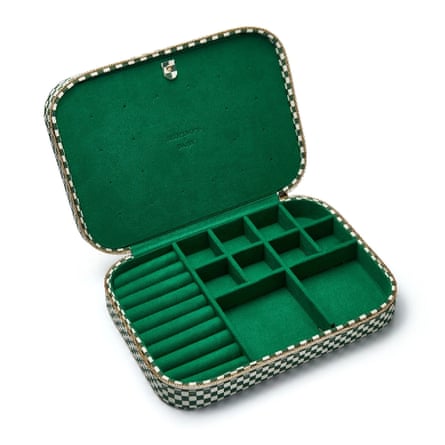 Open jewellery case with green inner lining