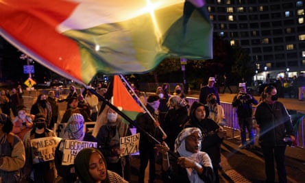 People demonstrate in support of Palestinians in Gaza, during a protest near the annual White House Correspondents’ Association in Washington DC.