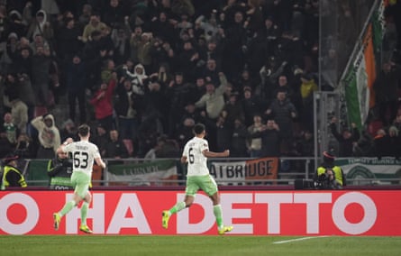 Celtic’s Auston Trusty, right, celebrates scoring in front of the travelling fans