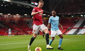 Manchester United’s Scott McTominay shields the ball from Manchester City forward Raheem Sterling.