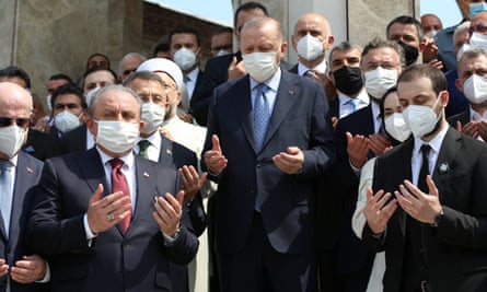 The Turkish president Recep Tayyip Erdoğan (centre) attends the opening ceremony of the Taksim mosque