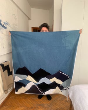 Daniel W Fletcher with his finished patchwork quilt