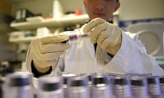 (FILES) This file photo taken on December 15, 2015 shows a technician holding blood samples about to be tested at the French national anti-doping laboratory, in Chatenay-Malabry, outside Paris. 
US officials have opened an investigation into explosive allegations of a government orchestrated doping programme in Russia involving dozens of its top athletes, the New York Times reported on May 18, 2016. The daily cited two people with knowledge of the inquiry by the Justice Department, which the Times said is being led by the United States attorney's office for the Eastern District of New York. Prosecutors are investigating Russian government officials, athletes, coaches, anti-doping authorities and others who could stand to profit from an illicit doping scheme, said the Times.
 / AFP PHOTO / FRANCK FIFEFRANCK FIFE/AFP/Getty Images