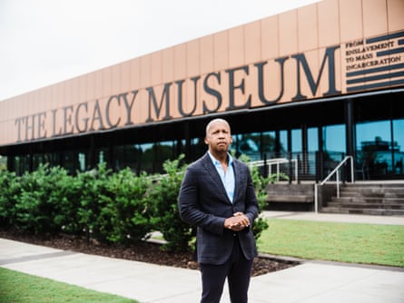 a man stands extracurricular a museum