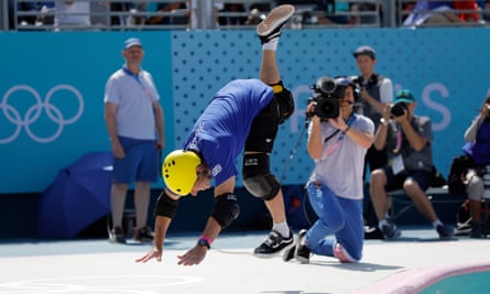 Macdonald takes a tumble in his first run of the men’s park skateboard competition
