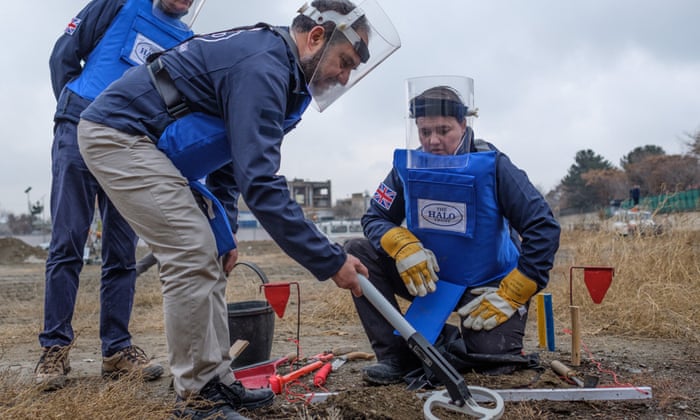 Scottish Conservative leader Ruth Davidson being given training on how to find, excavate and remove landmines by staff of the charity during her visit to Kabul.