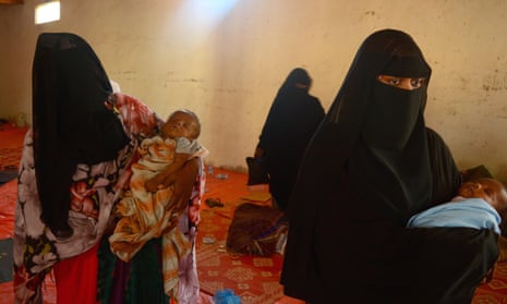 Yemeni refugees in Somalialand. Two women waiting to be transported to Hargeisa at a compound in Berbera where they spent the night after arriving from Yemen.