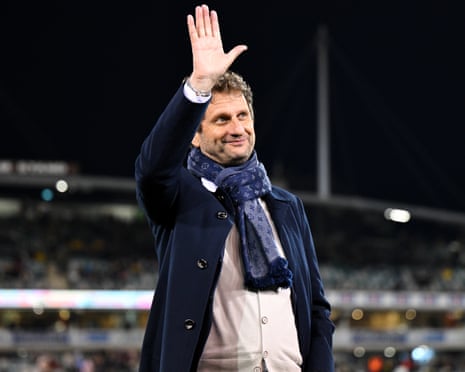 Joe Montemurro waves ahead of the match between Australia and Argentina at GIO Stadium