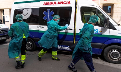 Paramedics arrive in an ambulance at the Elder retirement home in Tomelloso, central Spain At least 14 elderly residents have died after testing positive for coronavirus