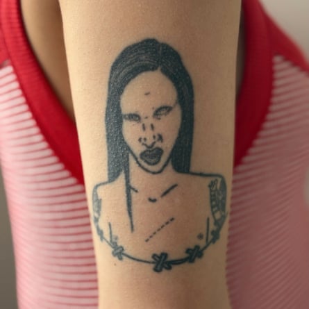 Olivia’s Marilyn Manson tattoo.