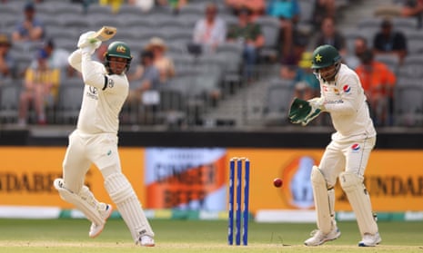 Usman Khawaja plays a cut shot as he rebuilds Australia’s innings on Day 3.