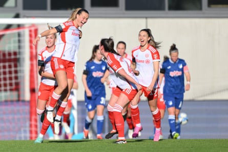 Klara Bühl celebrates with teammates after scoring against Hoffenheim